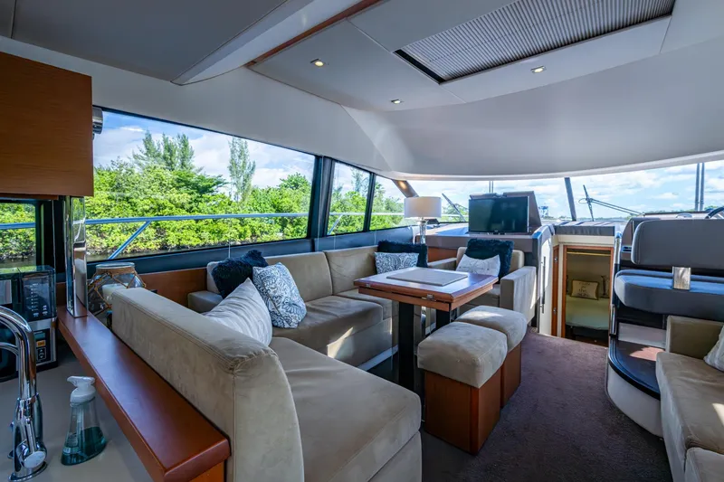 Slide: The Image of Luxurious interior of 2012 Prestige Flybridge yacht with plush seating and modern amenities. - 55