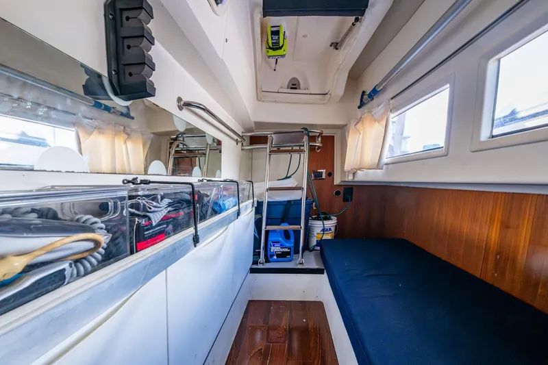 Slide: The Image of Interior of 2012 Prestige Flybridge yacht with storage and seating area. - 71