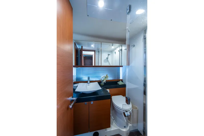 Slide: The Image of Luxurious bathroom in 2012 Prestige Flybridge yacht with modern fixtures and elegant design. - 90