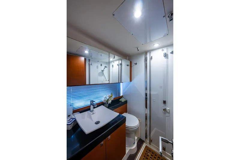 Slide: The Image of Luxurious bathroom in 2012 Prestige Flybridge yacht with modern fixtures and elegant design. - 93