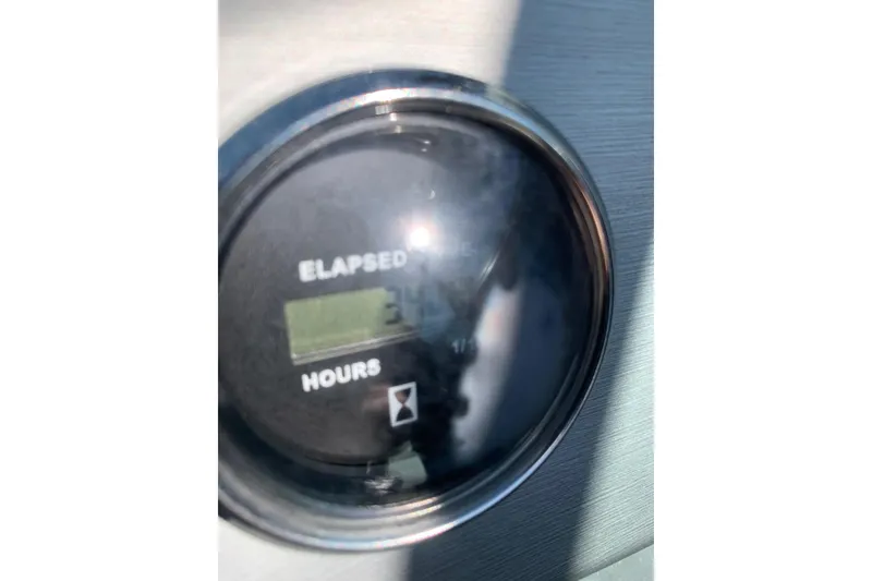 Slide: The Image of Elapsed time gauge on a 2015 Bryant Calandra, displaying 341 hours. - 12