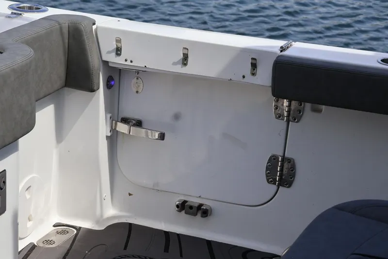 Slide: The Image of 2022 Sea Hunt Gamefish 30 Coffin Box interior detail with seating and hardware. - 23