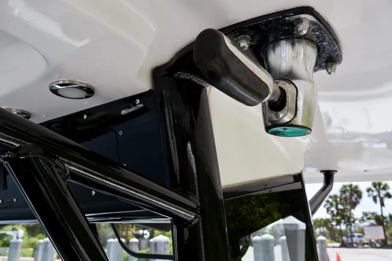 Slide: The Image of Close-up of a 2022 Sea Hunt Gamefish 30 Coffin Box boat's metal fixture. - 24