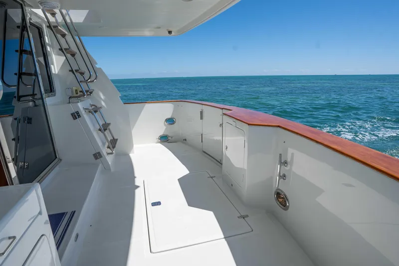 Slide: The Image of Spacious deck of 2001 Symbol 62 Pilothouse Yacht overlooking the ocean. - 11