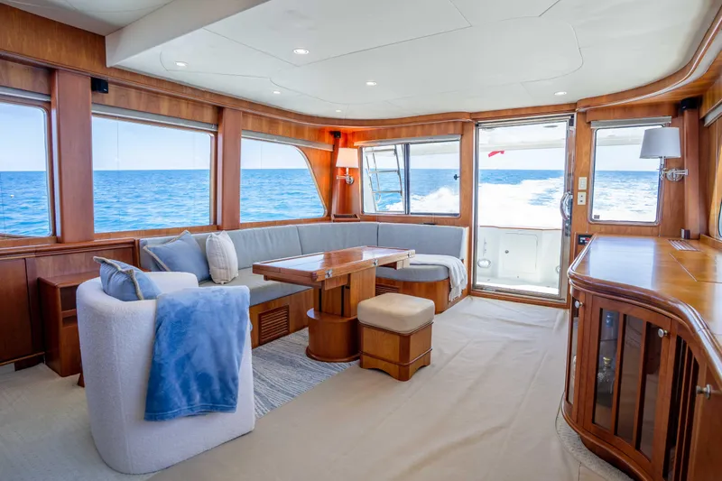 Slide: The Image of Luxurious interior of 2001 Symbol 62 Pilothouse Yacht with ocean view. - 14