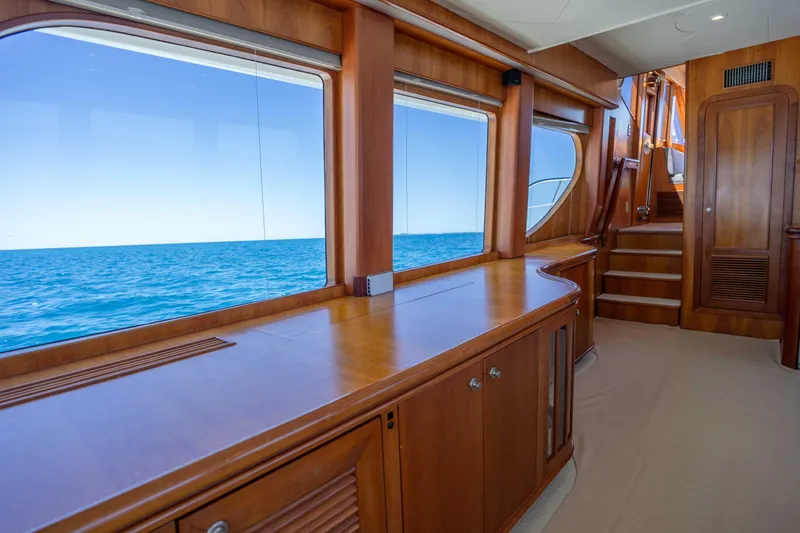 Slide: The Image of Luxurious interior of 2001 Symbol 62 Pilothouse Yacht with ocean view. - 17