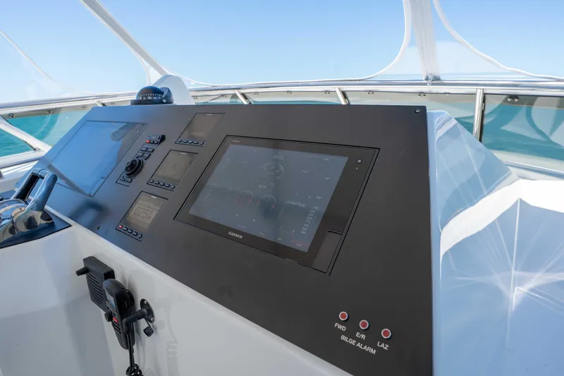 Slide: The Image of Pilothouse dashboard of 2001 Symbol 62 Pilothouse Yacht with navigation controls. - 47