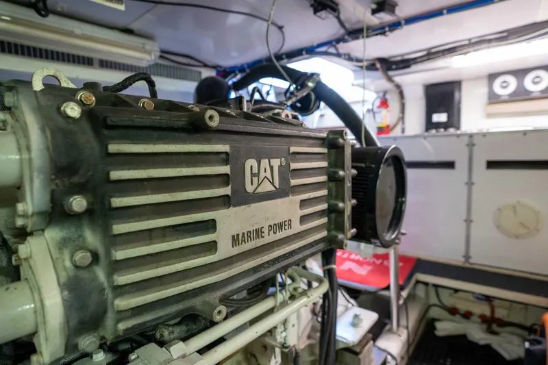 Slide: The Image of Engine room of 2001 Symbol 62 Pilothouse Yacht with CAT Marine Power engine. - 52