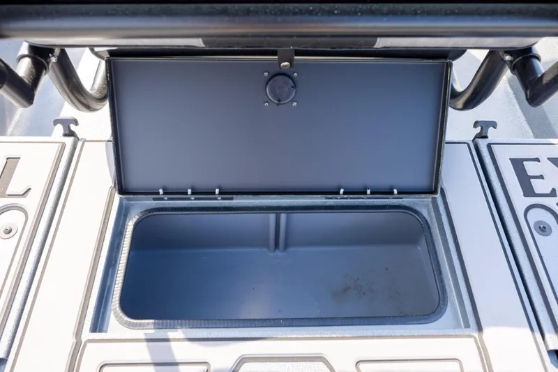 Slide: The Image of Open storage compartment on 2026 Excel 220 Bay Pro Elite boat deck. - 33