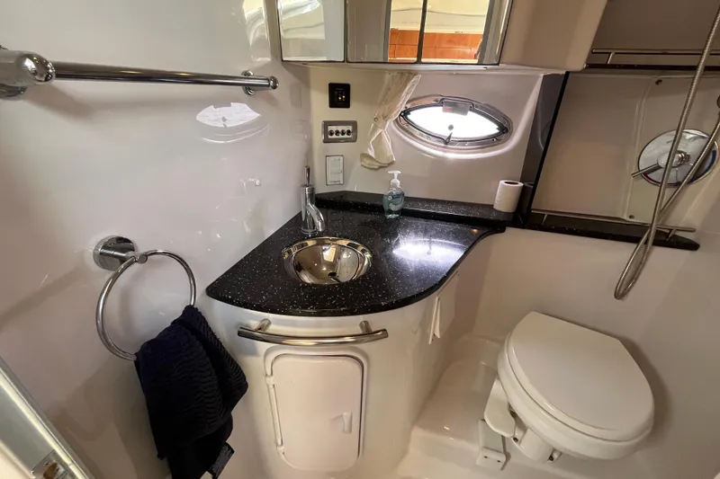 Slide: The Image of Luxurious 2008 Four Winns 338 Vista boat bathroom with sleek design and modern amenities. - 25