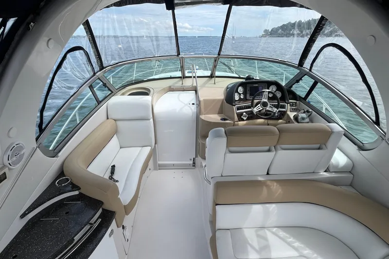 Slide: The Image of Interior of 2008 Four Winns 338 Vista yacht with luxurious seating and ocean view. - 29