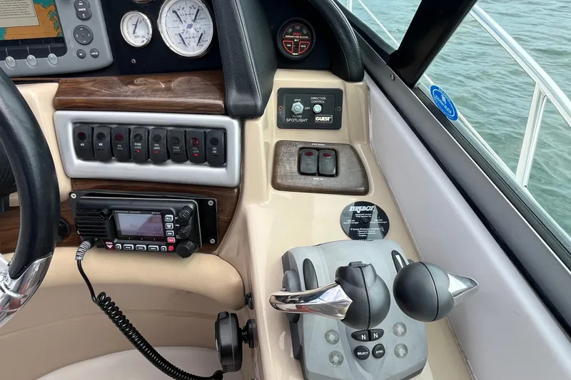 Slide: The Image of 2008 Four Winns 338 Vista boat dashboard with controls, gauges, and navigation equipment. - 37