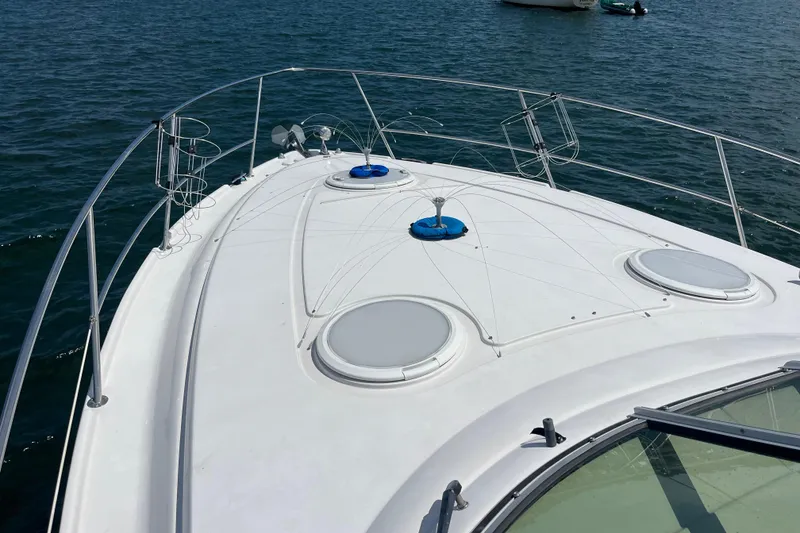 Slide: The Image of 2008 Four Winns 338 Vista boat deck on calm water. - 55