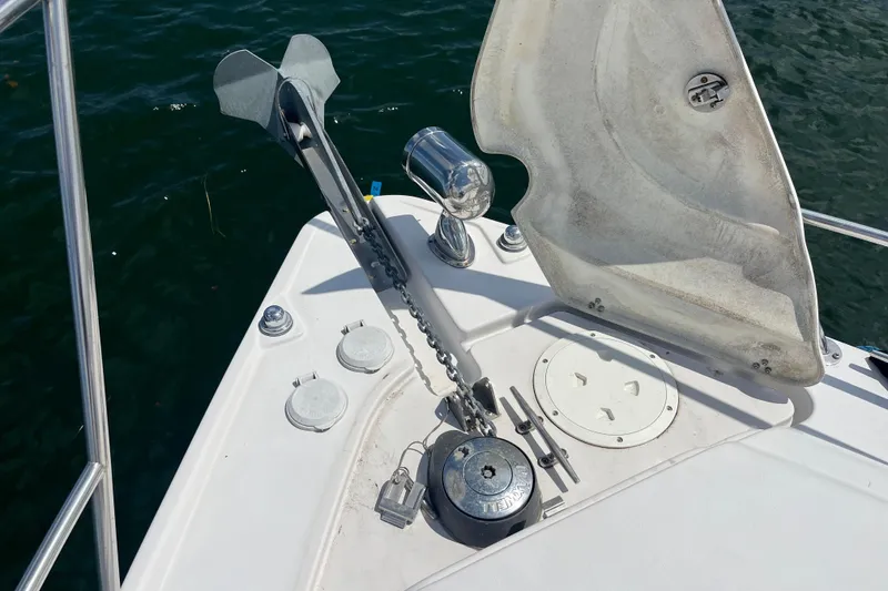 Slide: The Image of Bow of 2008 Four Winns 338 Vista with anchor and hatch details. - 56