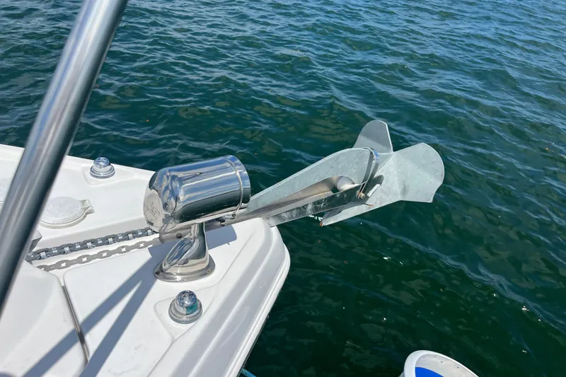 Slide: The Image of Anchor and chain on 2008 Four Winns 338 Vista boat in water. - 57