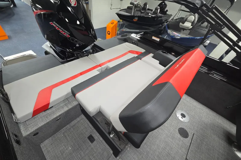 Slide: The Image of 2026 Princecraft Ventura 230 WRL boat interior with stylish seating and modern design. - 13