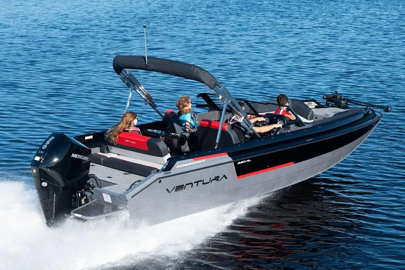 Slide: The Image of Manufacturer Provided Image: 2025 Princecraft Ventura 230 WRL boat cruising on a lake with passengers. - 2