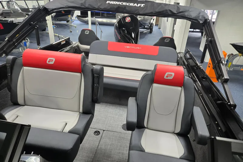 Slide: The Image of Interior of 2026 Princecraft Ventura 230 WRL boat with stylish seating and modern design. - 23