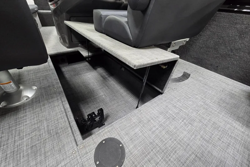 Slide: The Image of Interior view of 2026 Princecraft Ventura 230 WRL boat, showcasing seating and storage area. - 24