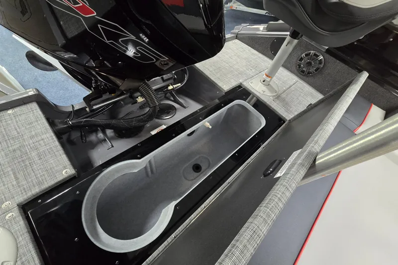 Slide: The Image of Interior view of 2026 Princecraft Ventura 230 WRL boat, showcasing storage compartment and seating. - 28