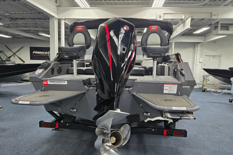 Slide: The Image of 2026 Princecraft Ventura 230 WRL boat with dual seats and powerful outboard motor. - 29