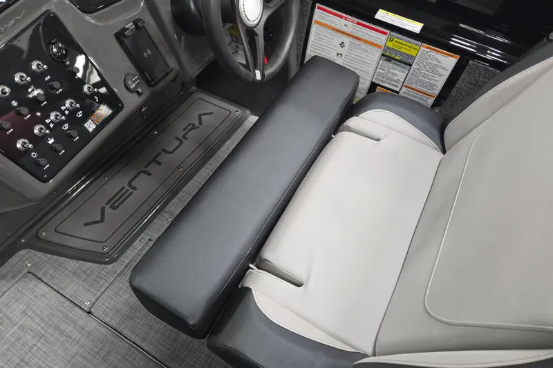 Slide: The Image of 2026 Princecraft Ventura 230 WRL interior with steering wheel and control panel. - 9