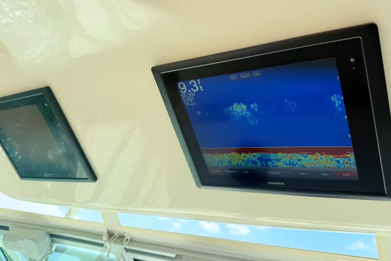Slide: The Image of Garmin marine display on 2015 Grady-White Express 370 boat, showing sonar data. - 10