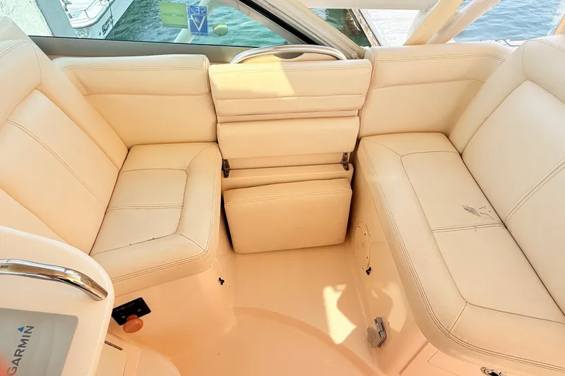 Slide: The Image of Luxurious seating area on a 2015 Grady-White Express 370 boat. - 15