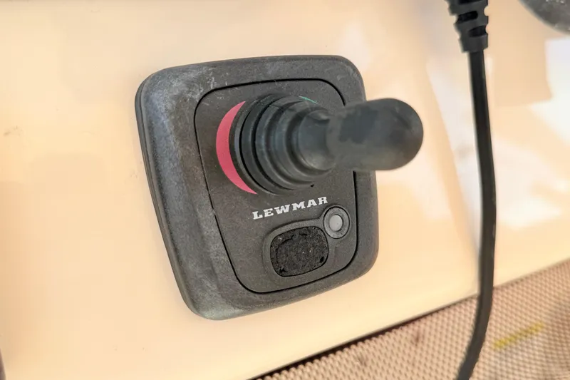 Slide: The Image of Lewmar joystick control on 2015 Grady-White Express 370 boat dashboard. - 17