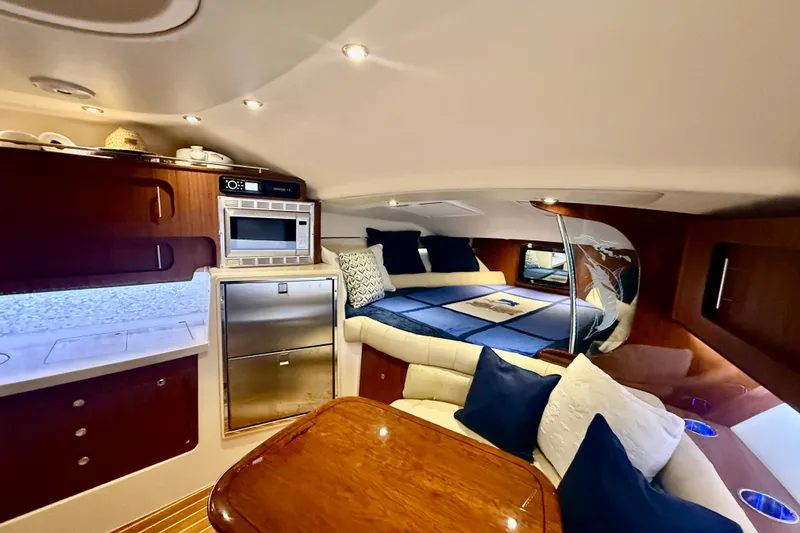 Slide: The Image of Luxurious interior of 2015 Grady-White Express 370 yacht with cozy seating and modern amenities. - 23