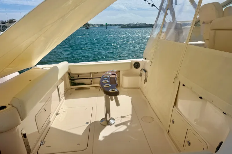 Slide: The Image of 2015 Grady-White Express 370 boat interior with ocean view and seating area. - 3