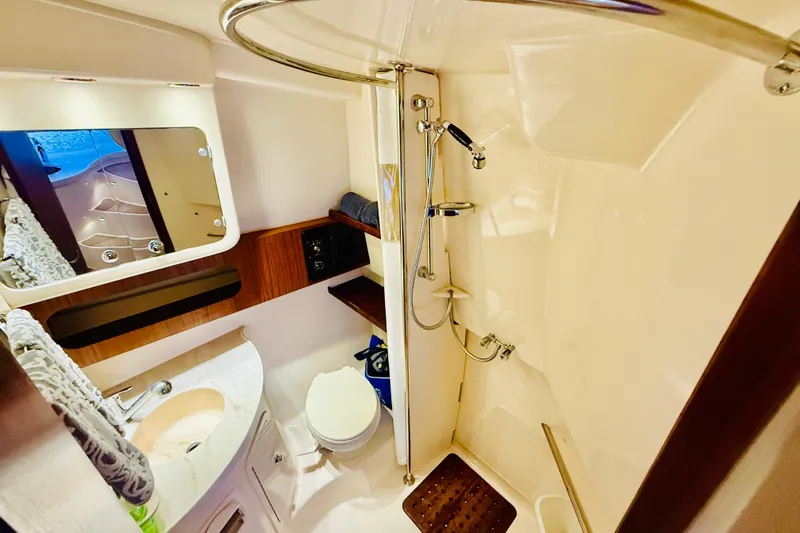 Slide: The Image of Luxurious bathroom in 2015 Grady-White Express 370 yacht with shower and vanity. - 32