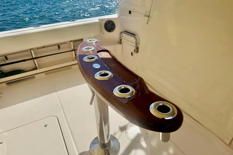 Slide: The Image of 2015 Grady-White Express 370 boat deck with rod holders and ocean view. - 6