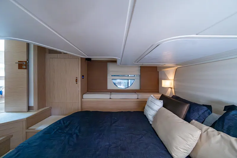Slide: The Image of Luxurious cabin interior of 2015 Beneteau Monte Carlo yacht with cozy bedding. - 10