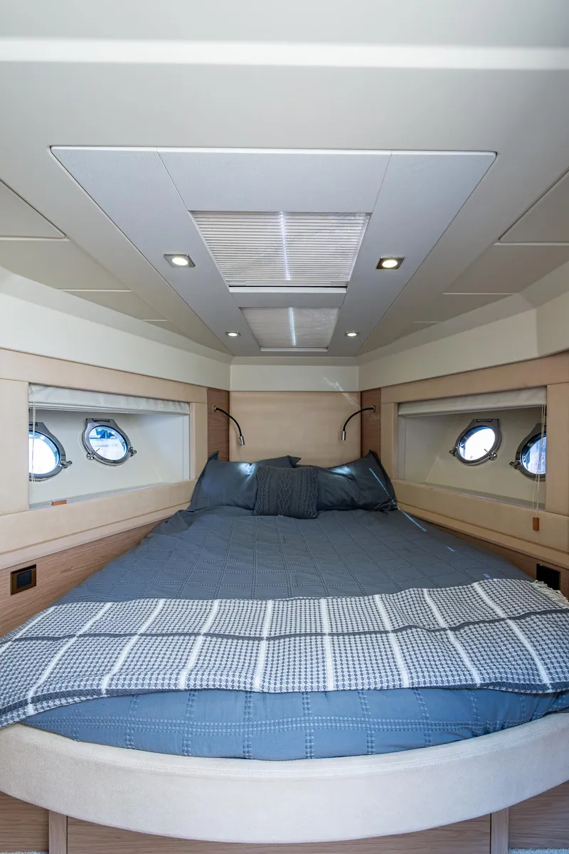 Slide: The Image of Luxurious cabin interior of 2015 Beneteau Monte Carlo yacht with cozy bedding. - 36