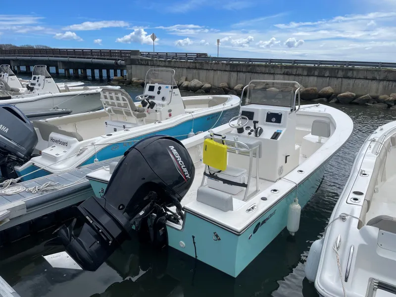 The Image of 2023 May-Craft 208 CC boat docked with outboard motor. - 0