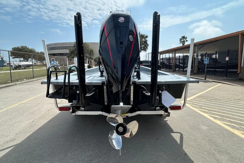 Slide: The Image of 2026 Skuta 24 Vista boat rear view with powerful outboard motor. - 6