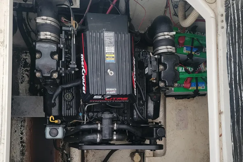 Slide: The Image of Engine compartment of a 1998 Bayliner 3255 Avanti with MerCruiser 5.7L engine. - 19