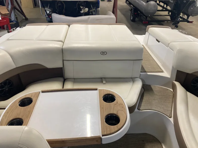 Slide: The Image of Interior of a 2013 Cobalt 200 boat with white seating. - 16