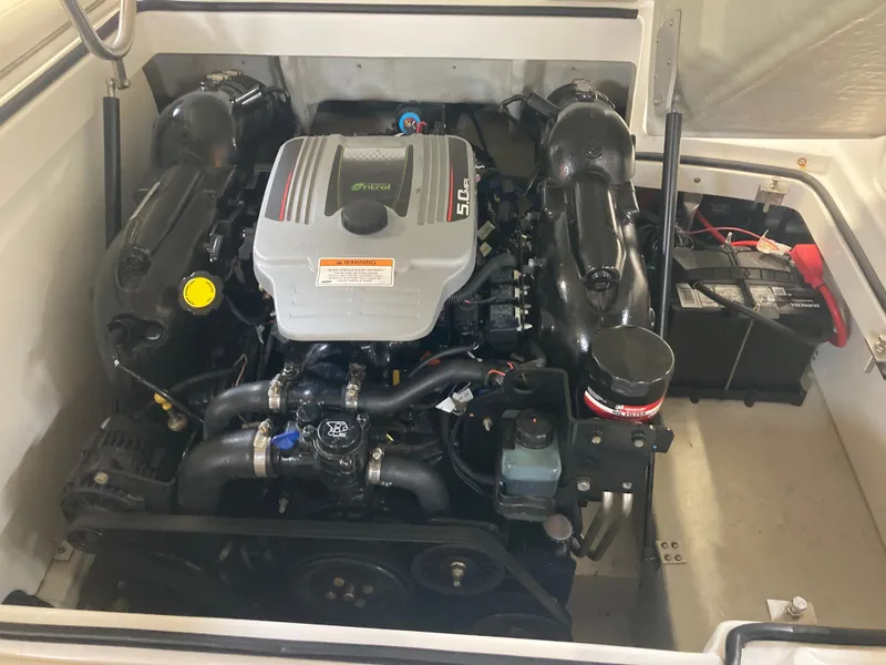 Slide: The Image of Engine compartment of a 2013 Cobalt 200 boat with 5.0L engine. - 17