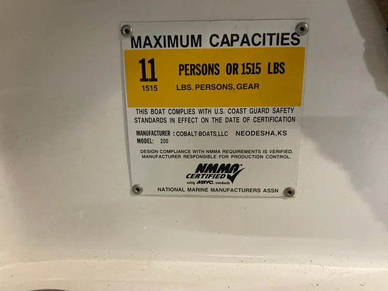 Slide: The Image of Capacity label for Cobalt 200 boat, 11 persons or 1515 lbs. - 25