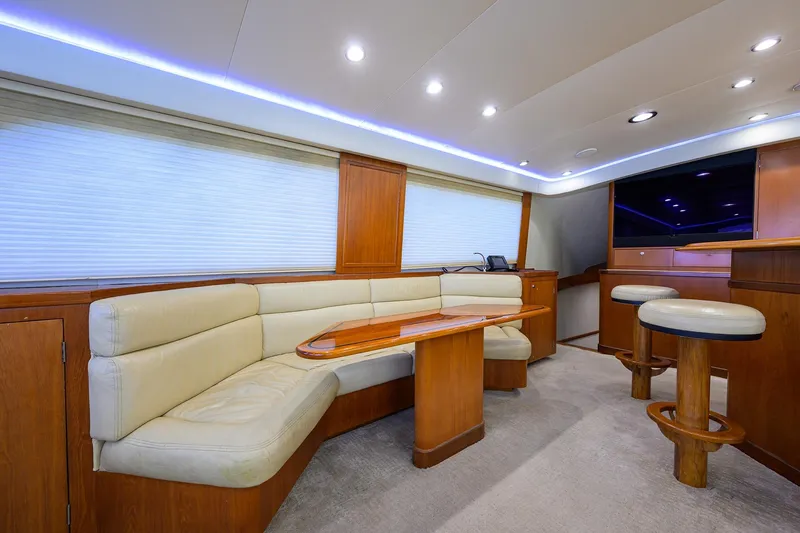 Slide: The Image of Luxurious interior of a 2003 American Custom Yachts Sport Fisherman, featuring plush seating and modern design. - 20