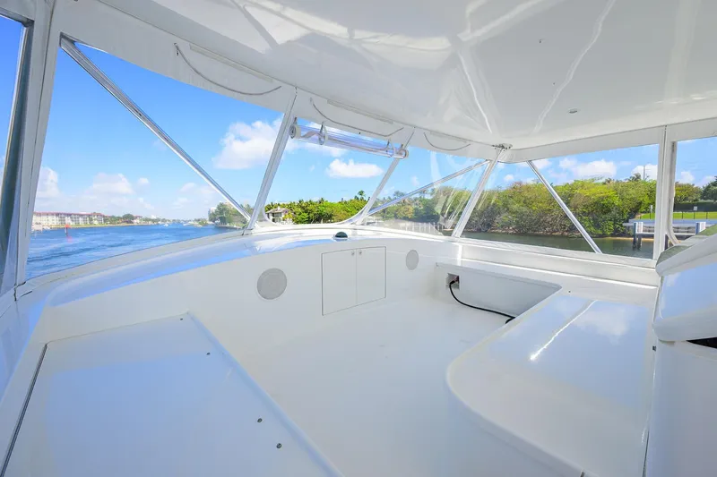Slide: The Image of 2003 American Custom Yachts Sport Fisherman interior with panoramic water views. - 57