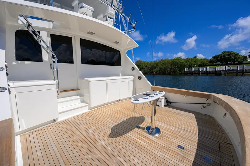 Slide: The Image of Luxurious 2003 American Custom Yachts Sport Fisherman deck with scenic waterfront view. - 7