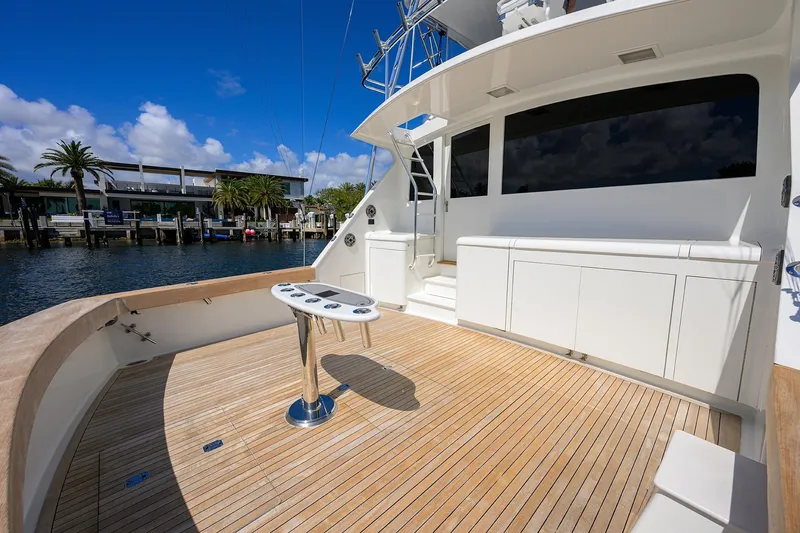 Slide: The Image of 2003 American Custom Yachts Sport Fisherman with spacious deck and modern amenities. - 9