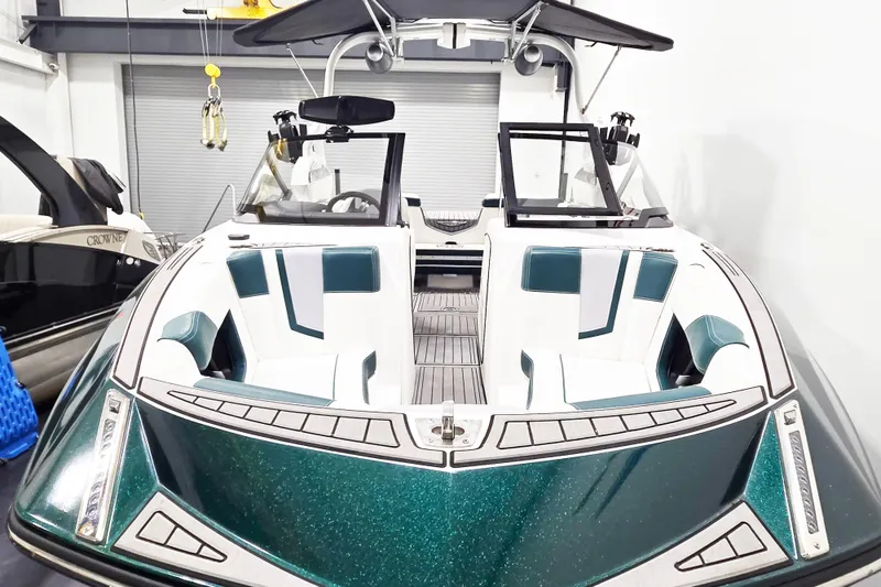 Slide: The Image of 2020 Nautique Super Air Nautique G21 boat with sleek design and spacious seating. - 5