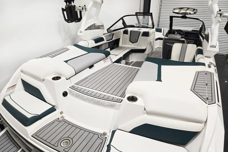 Slide: The Image of 2020 Nautique Super Air Nautique G21 interior with sleek seating and modern design. - 9