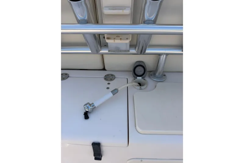 Slide: The Image of 2008 Grady-White Canyon 336 boat deck with hose and rod holders. - 12