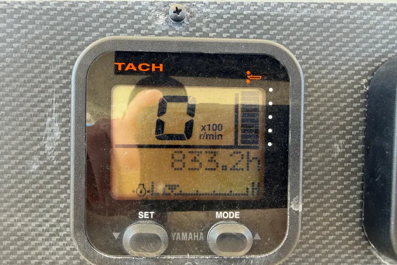 Slide: The Image of Yamaha tachometer display on 2008 Grady-White Canyon 336 boat, showing 833.2 hours. - 19