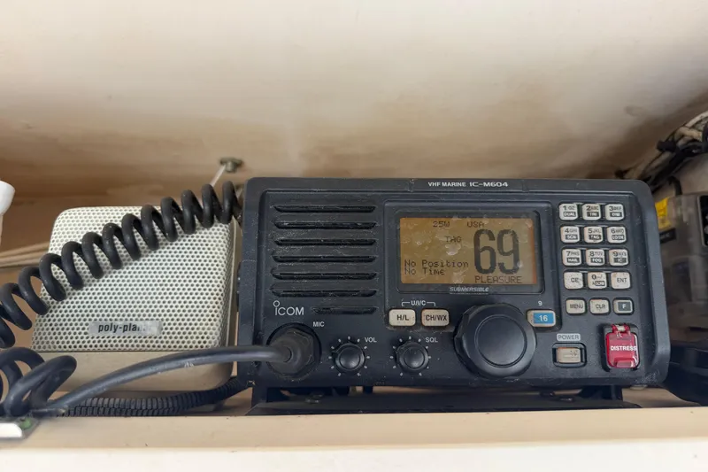 Slide: The Image of VHF marine radio on a 2008 Grady-White Canyon 336 boat dashboard. - 26